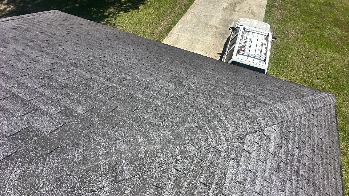 Residential Roofing Installation using Benton 26Ga 1inc Snapcock Metal Roof KYNAR Matte Black by Talya Roofing