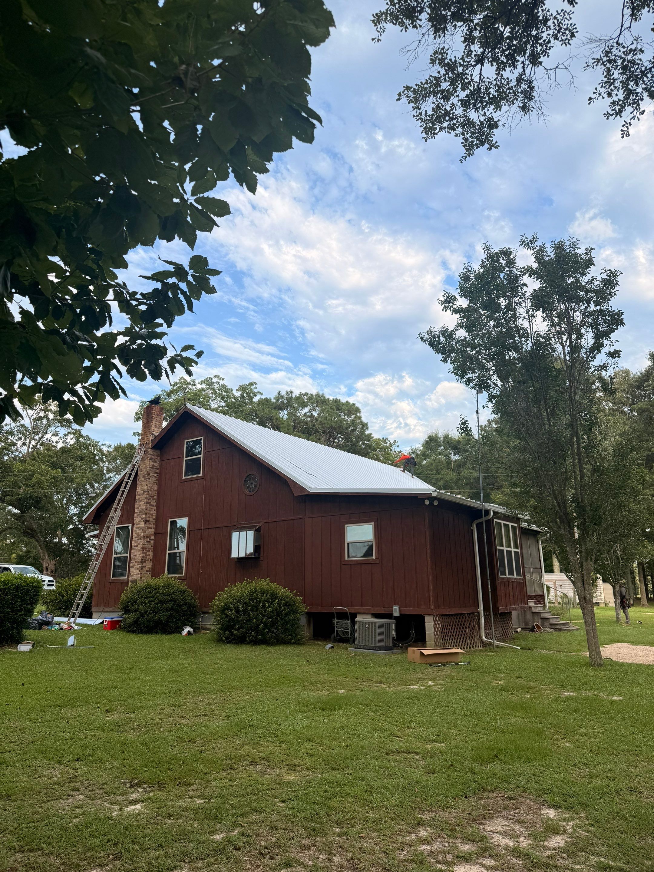 Residential Metal Roof Replacement With Corrugated Panels in Poplarville by Frontline Roofing