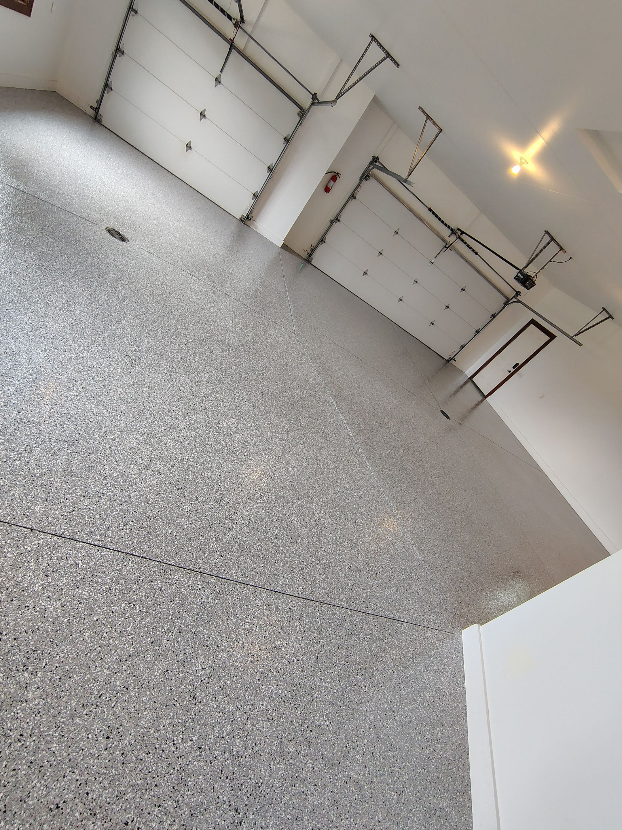Feather Grey Floor Coating in Sioux Falls, SD by Select Painting, Coatings & Garage Cabinets