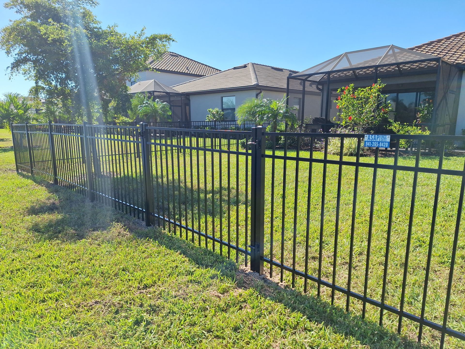 Aluminum Fence Installation using 4ft 3 Rail Black Aluminum Fence by Asap fence and gates, LLC