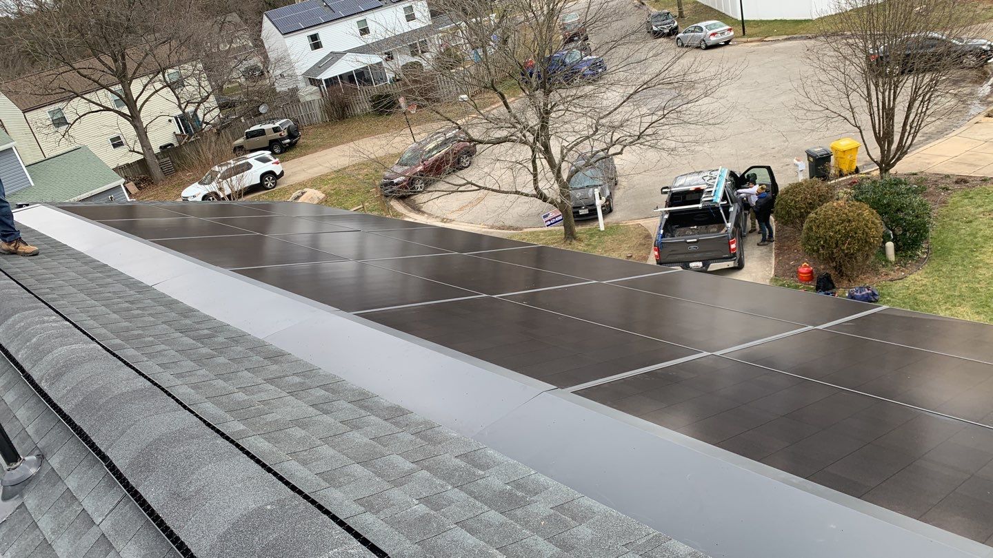 Roof Replacement with GAF Decotech integrated solar panels by American Home Contractors