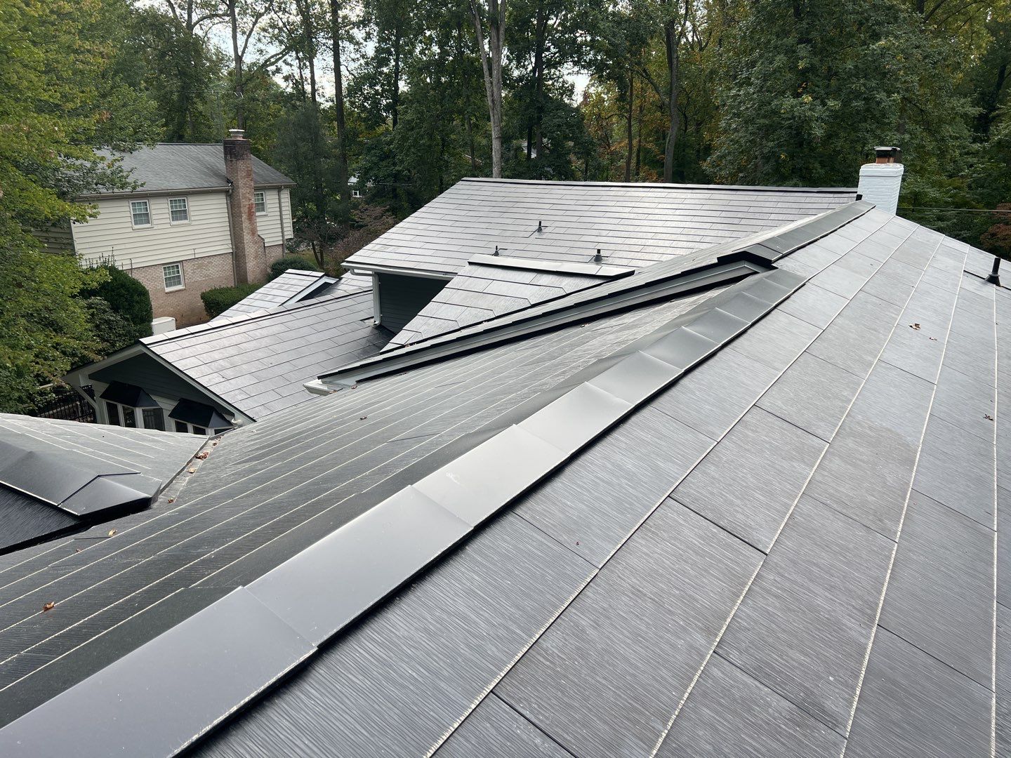 Tesla Solar Roof Replacement using Tesla Solar Roof V3 Tiles by American Home Contractors