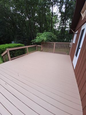 Muskegon Deck Restoration with Pressure Treated Railings and Wood Staining