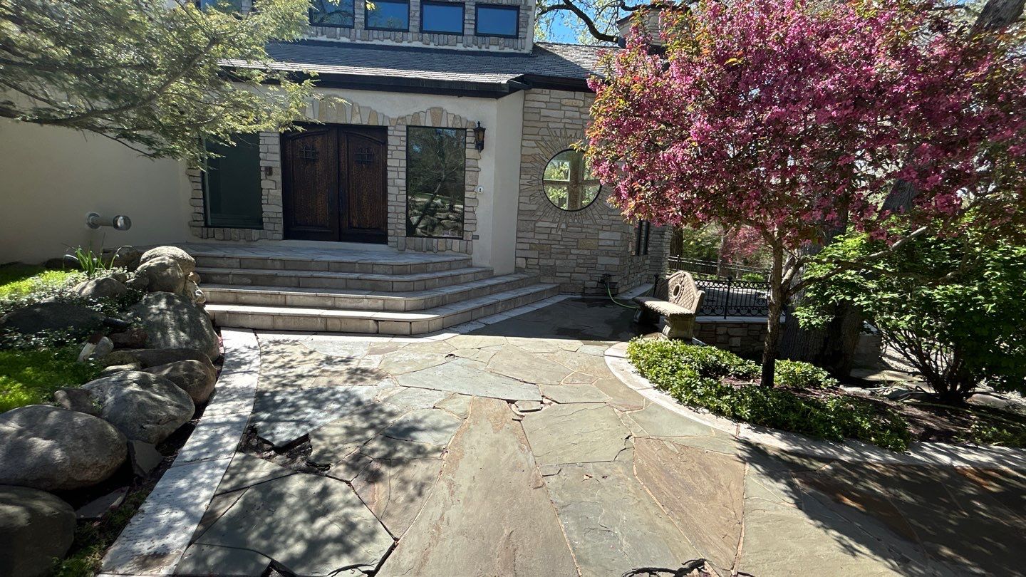 natural stone using Algaecide, soft wash soap by Northern Power Washing LLC.