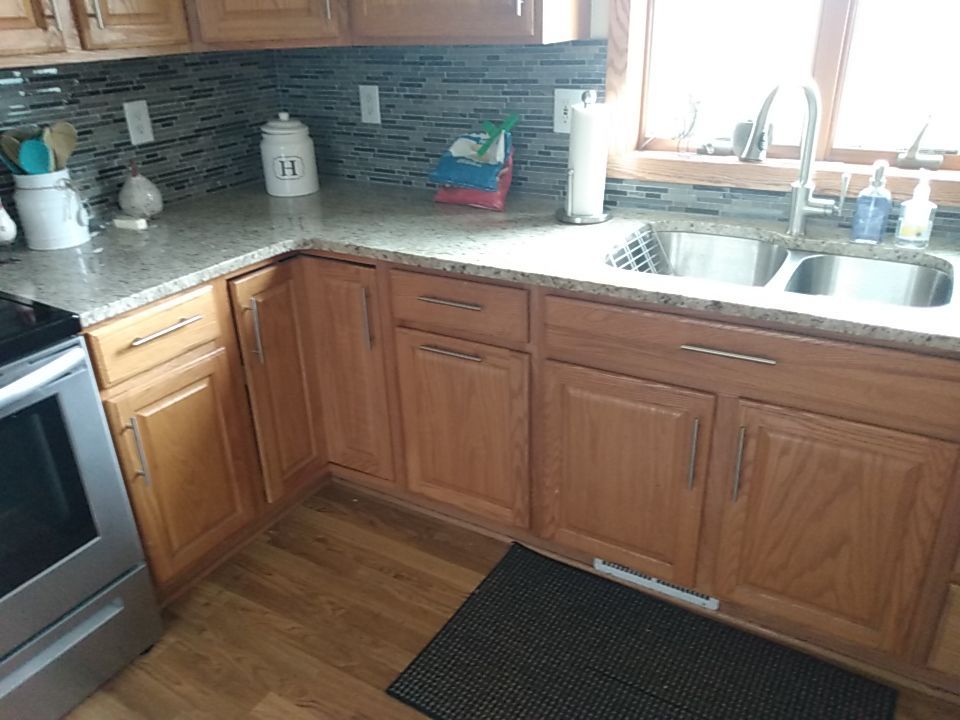 Kitchen cabinet repaint by Cutting edge painting 