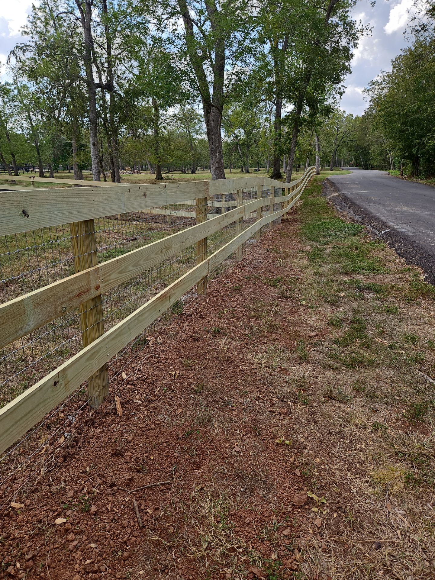 Ranch Style fence Plus Iron installation by Tim's Fences