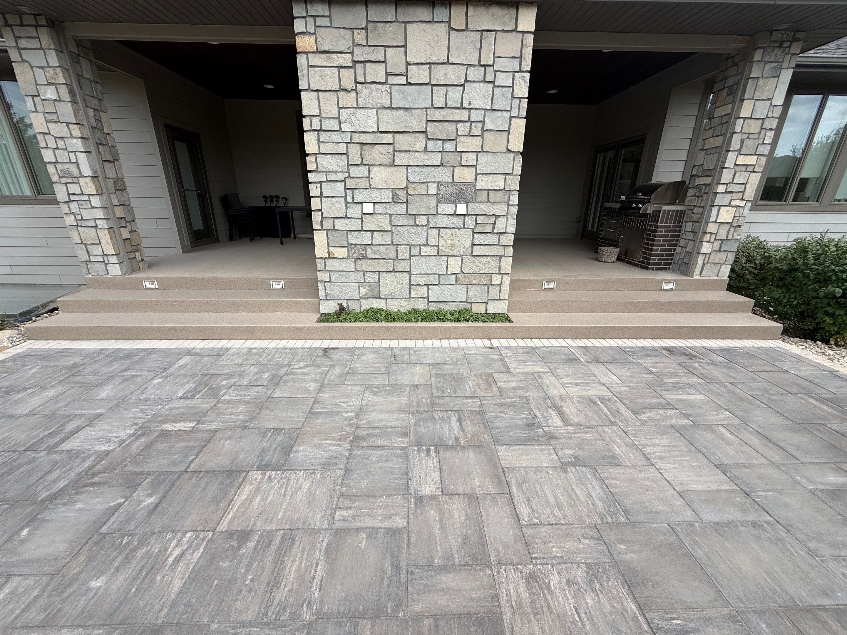 Sioux Falls Patio Concrete Coating and Porch Step Repair by Select Painting, Coatings & Garage Cabinets