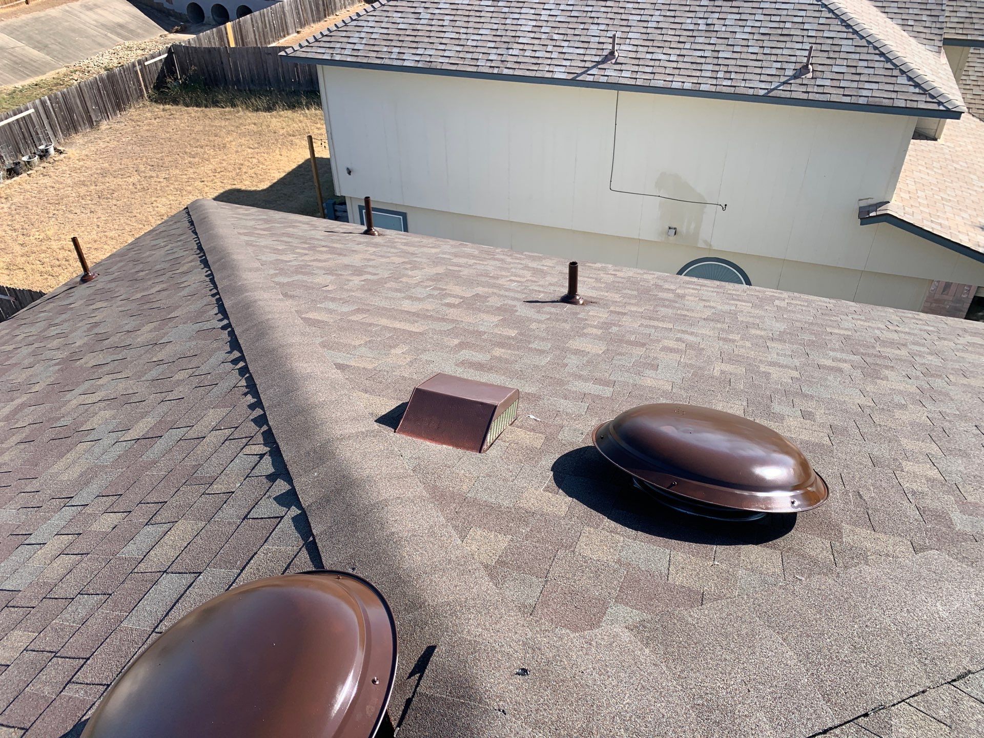 Asphalt Shingle Roof Replacement and Hail Damage Restoration in Hutto by Caliber Restoration LLC