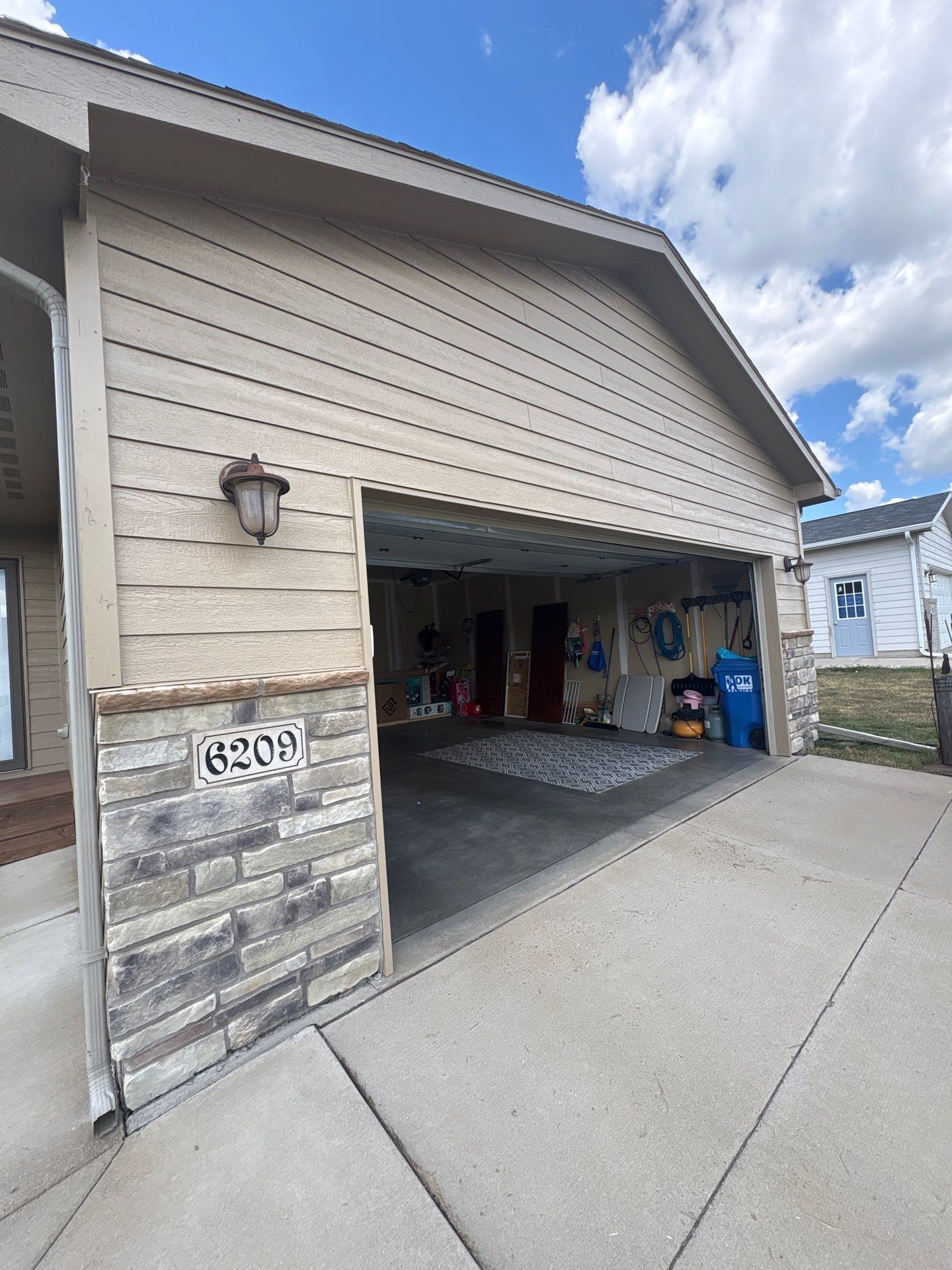 Exterior Painting and Custom Deck Construction in Sioux Falls by Select Painting, Coatings & Garage Cabinets