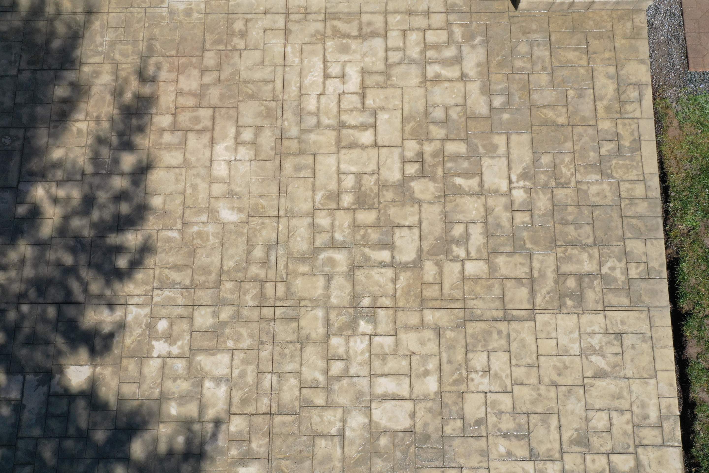 Benedict | Stamped Concrete Back Patio by Jireh Asphalt & Concrete Inc 