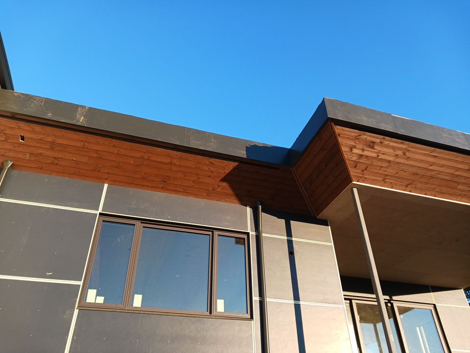 Residential Roofing Installation using multiple products by Top Notch Roofing Inc