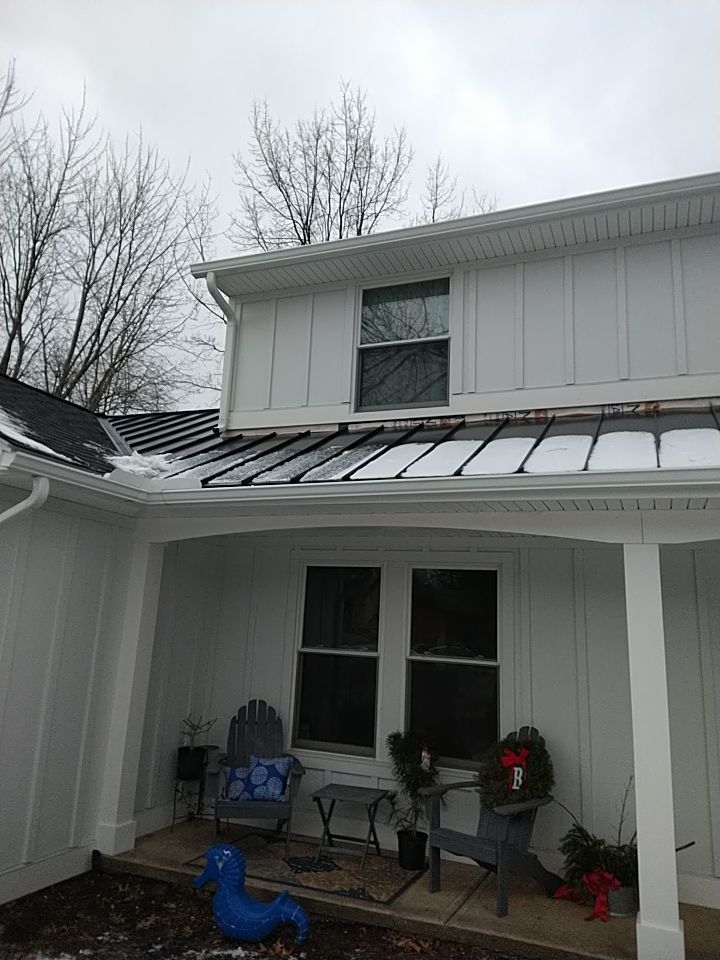 James Hardie Siding  using James Hardie Board and Batten, White by Absolute Roofing and Construction