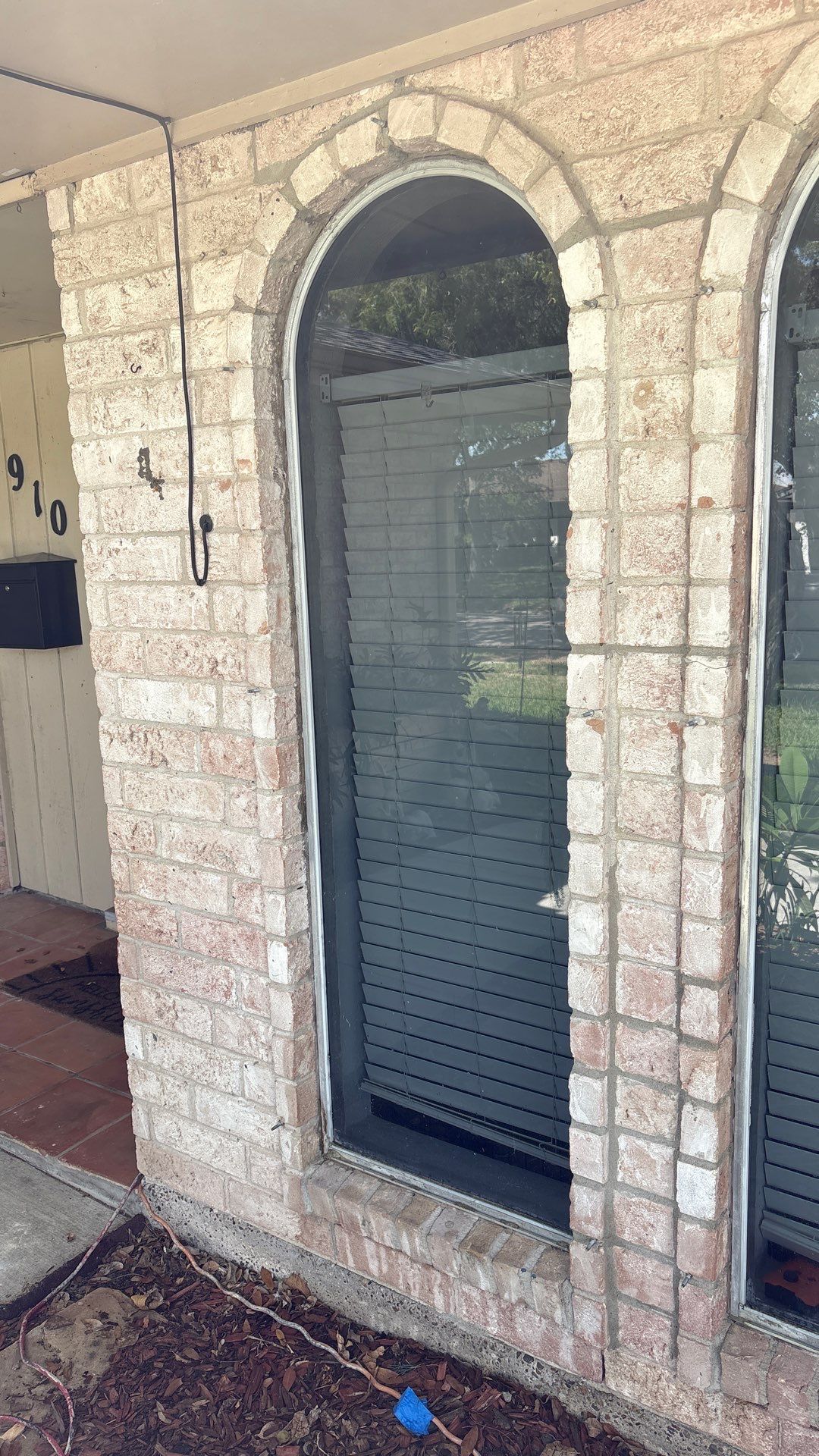Colored Vinyl Windows to blend into brick by Bayfront Roofing and Construction
