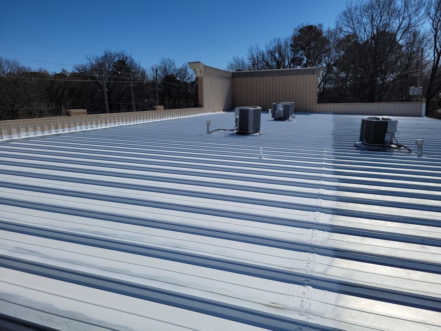 Commercial Metal Restoration System using Aldocoat Coatings by Hostetler Roofing