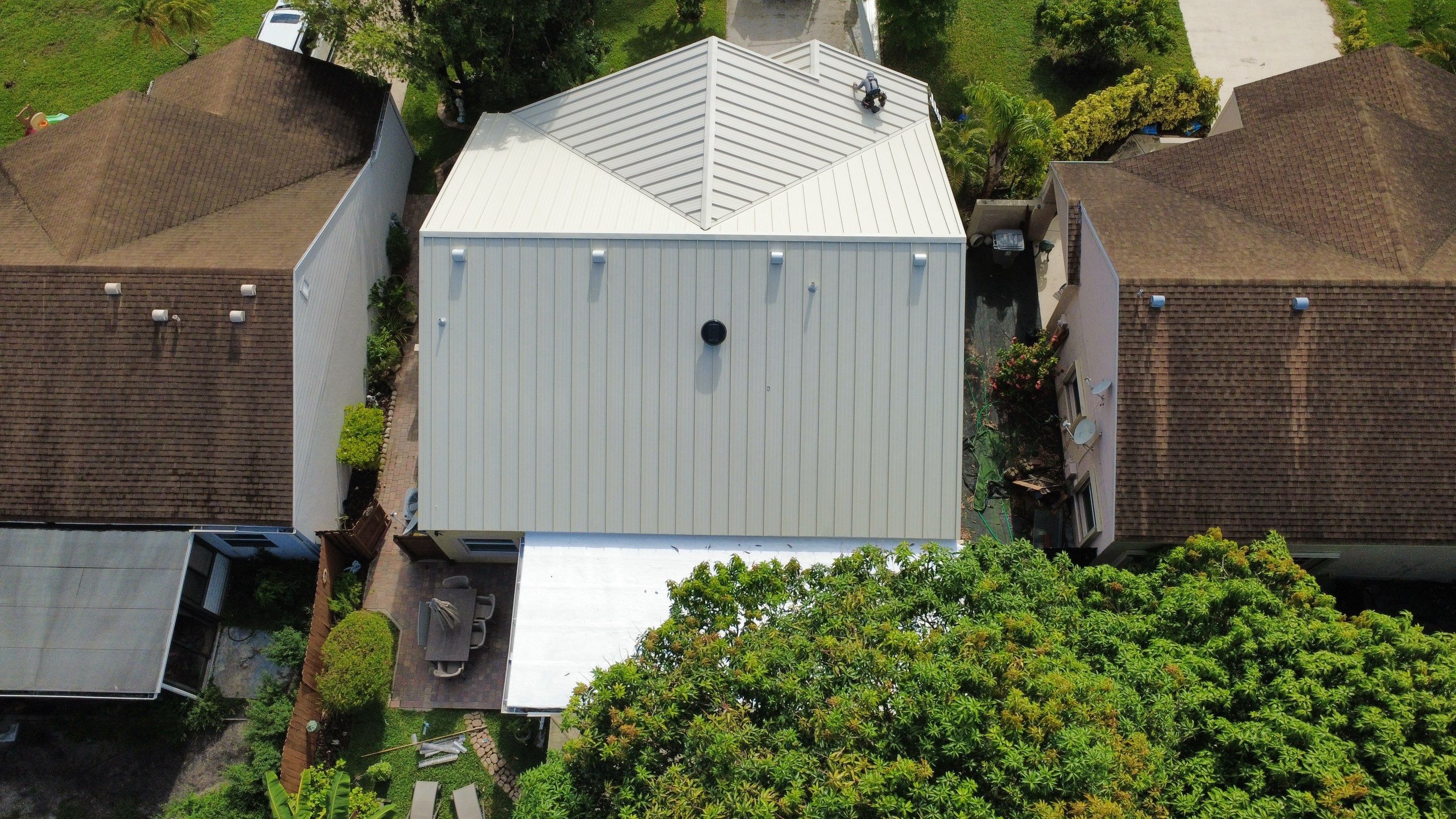 Residential Roofing Installation using 1.5'' Mechanical Seam by BLUES BROTHERS ROOFING