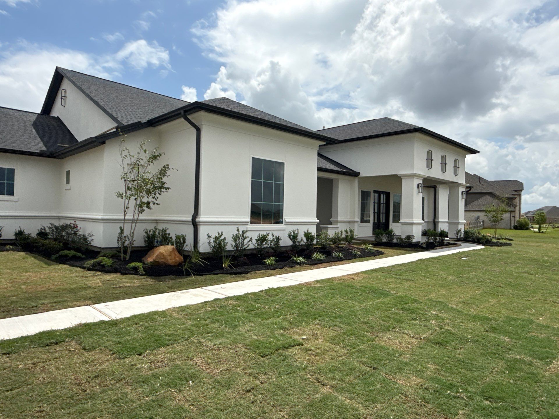 Custom Stucco Masterpiece with Precision Foam Detailing – Waller, TX by Apex Conventional Stucco Llc