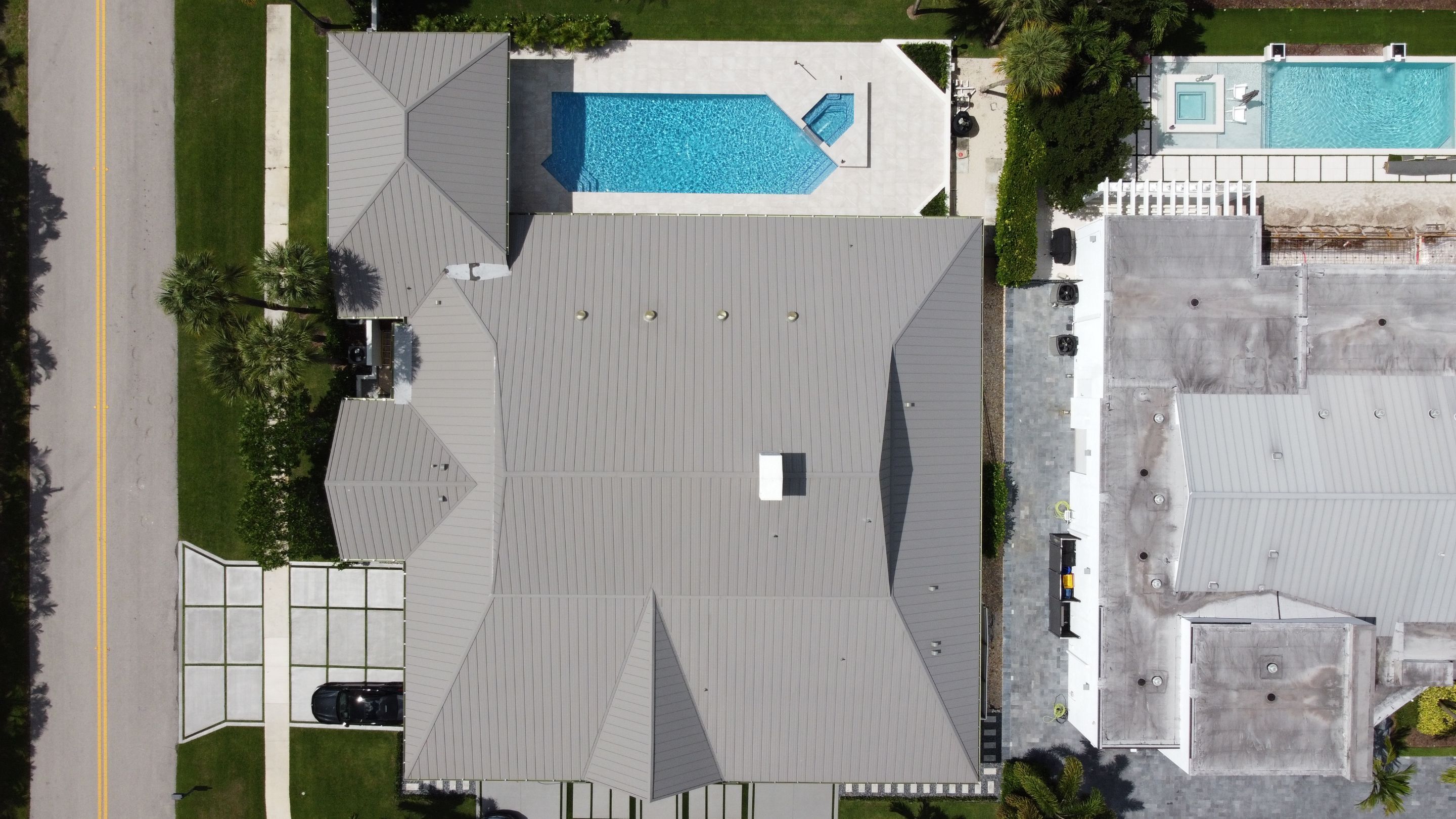 Residential Roofing Installation using 1" Nail strip metal roof by BLUES BROTHERS CONSTRUCTION CORP