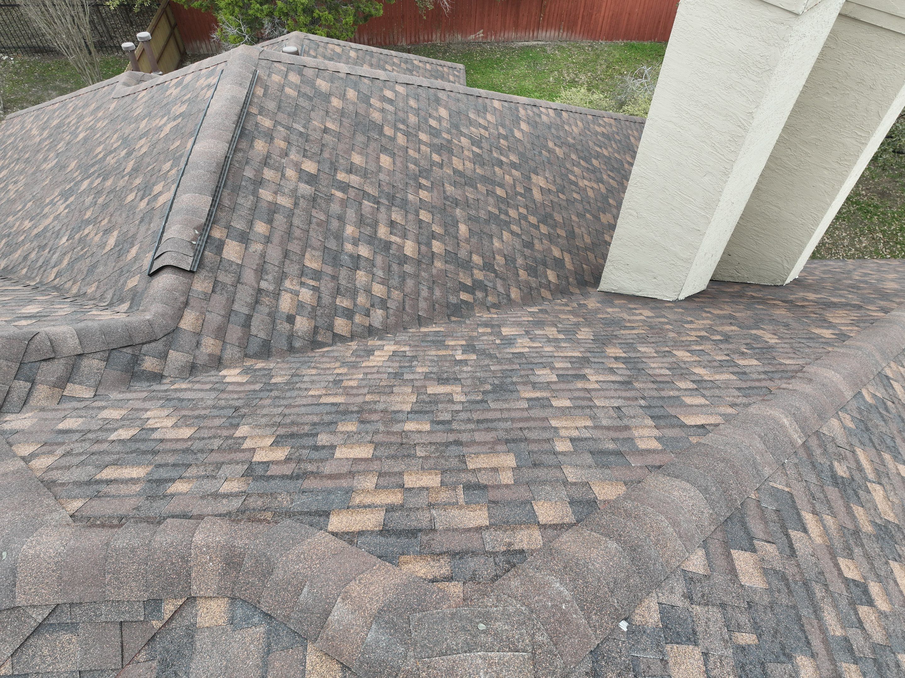 Residential Roof Replacement using 30 Year Laminate Shingles with High Profile Ridge by Premier Roofing and Contracting