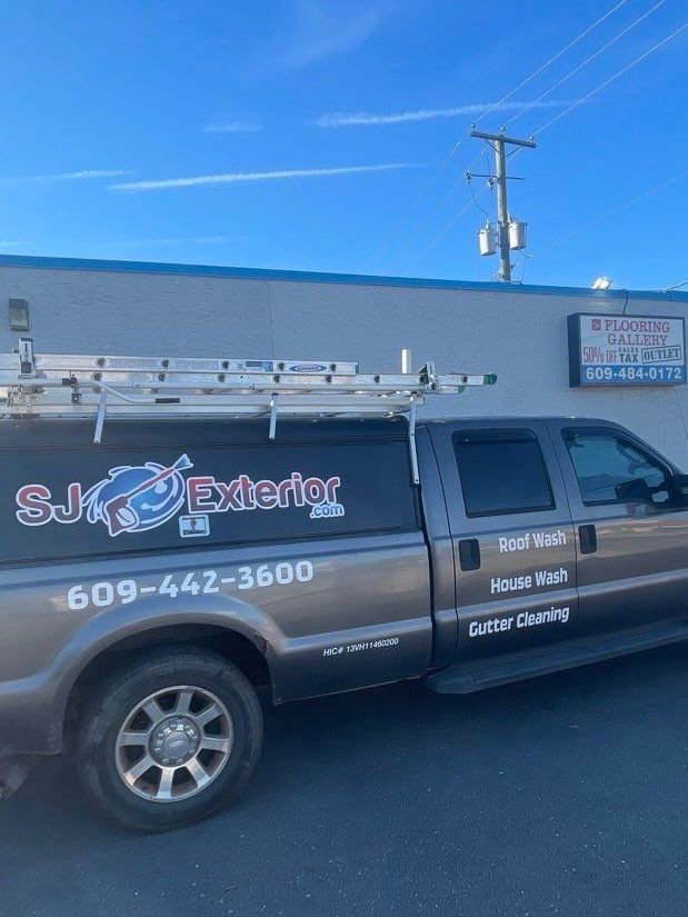 Building SoftWash & Concrete Cleaning  by SJ Exterior
