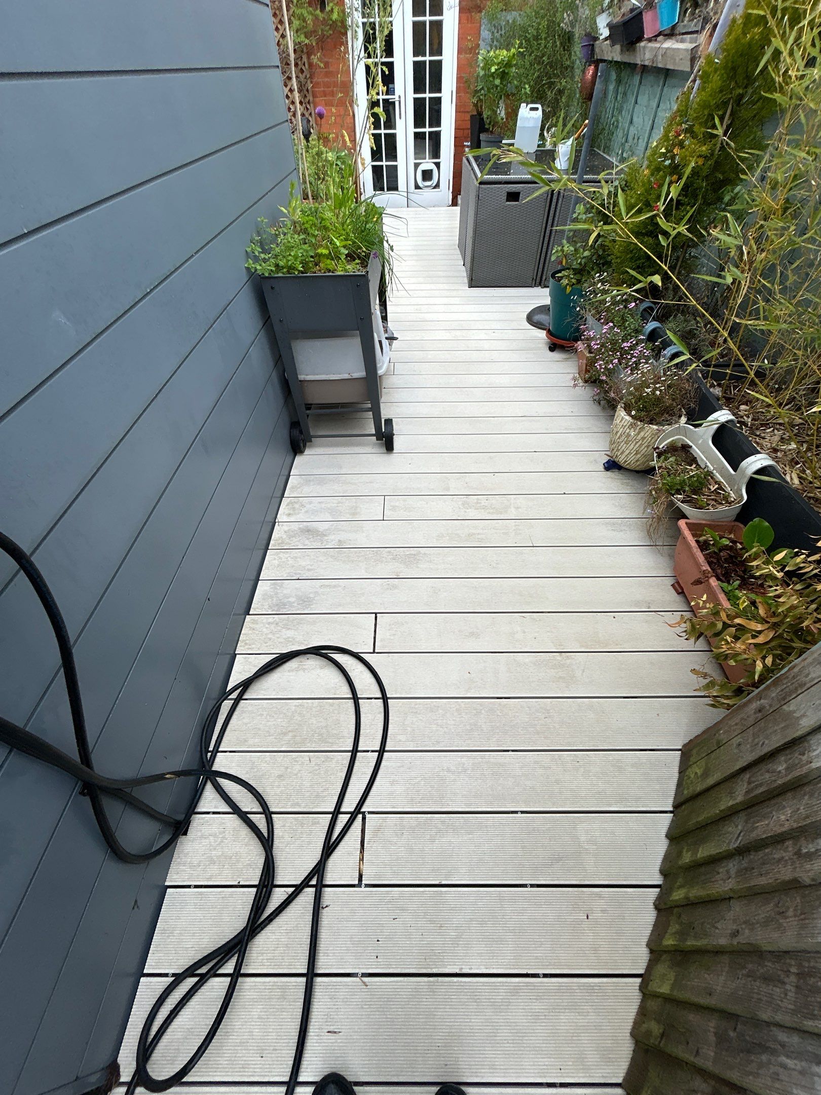 Composite Decking Clean Epsom by Ges Exterior Cleaning ltd