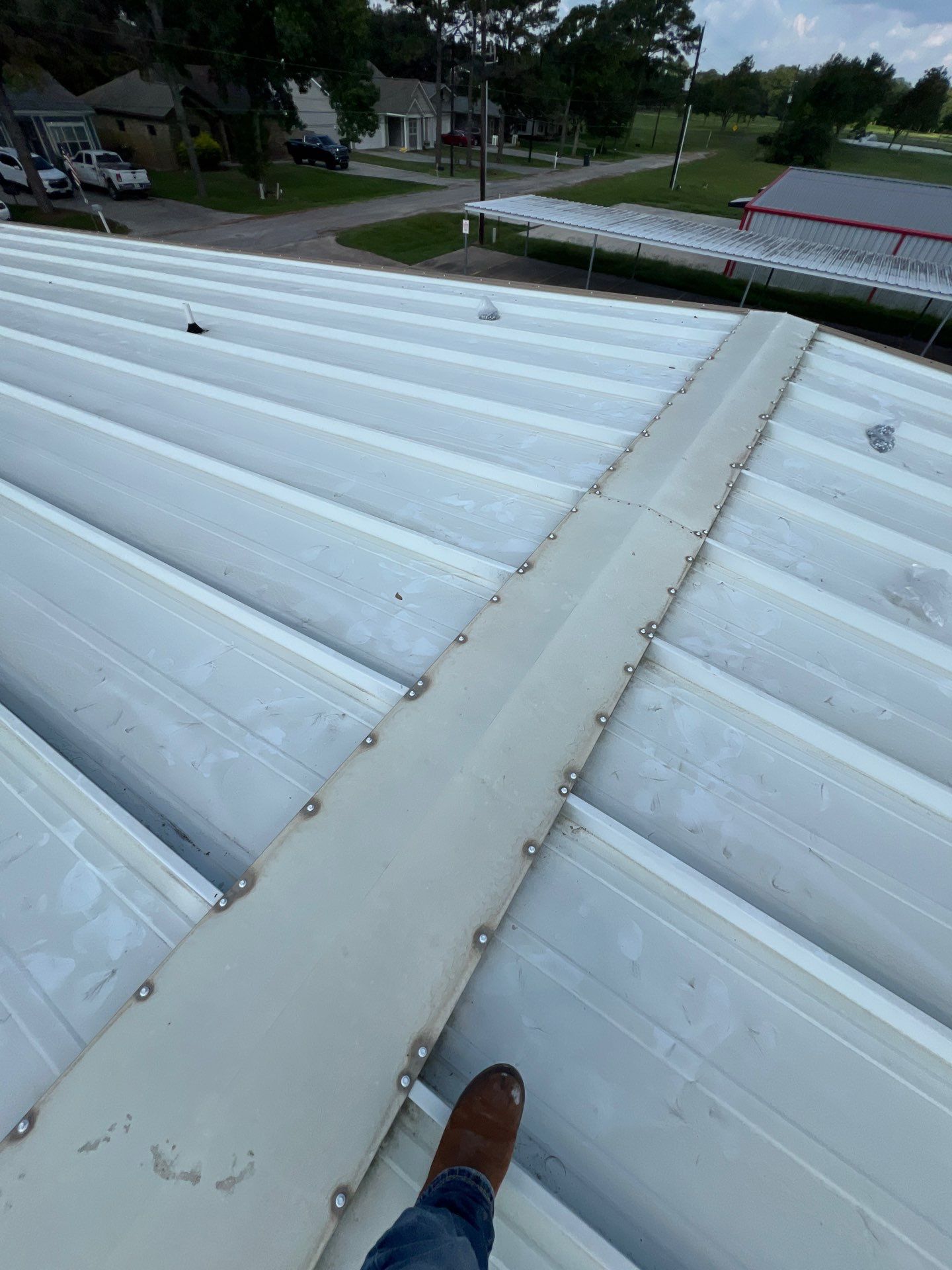 Commercial Roofing Repair using Metal by Roof Repair Company