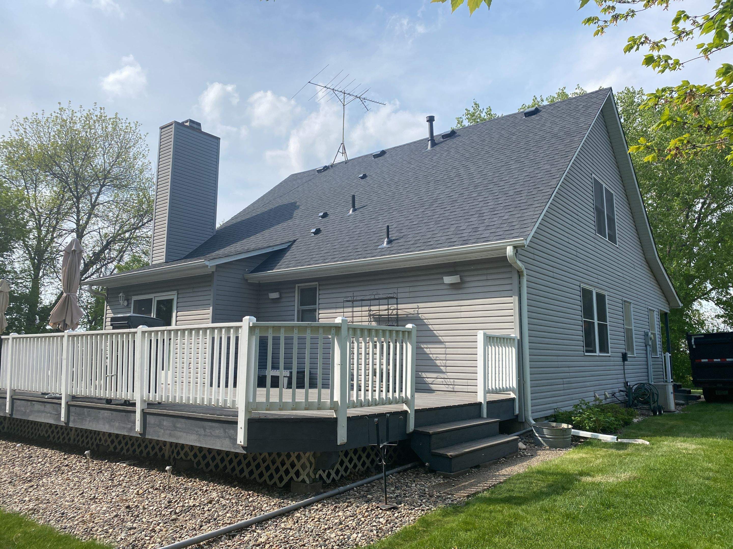Residential Roofing Installation using Certainteed Landmark Moire Black by MODERN EXTERIOR SYSTEMS