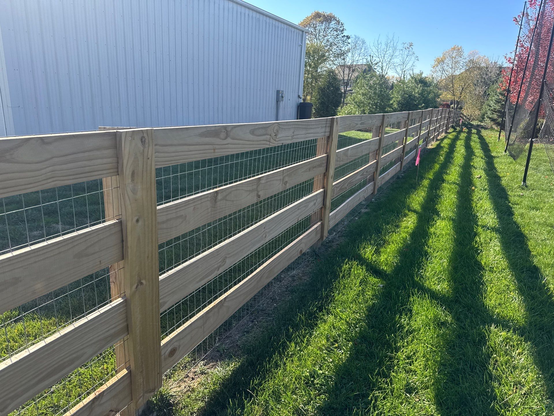 Convert Corral Fence into Privacy Fence by Farmer Home Solutions