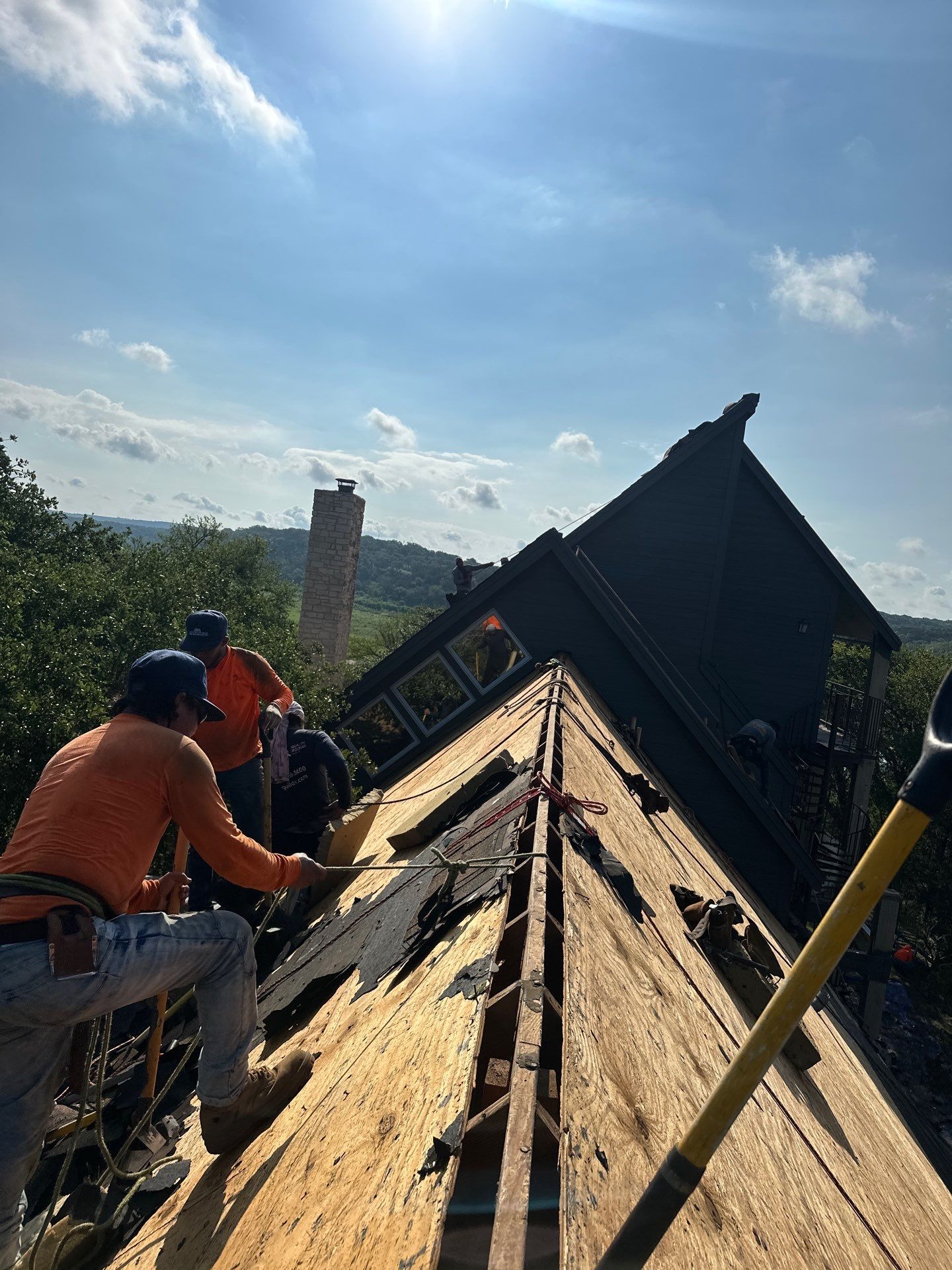 Residential Roofing Installation using IKO Nordic Granite Black by DeZign Roofing & Exteriors