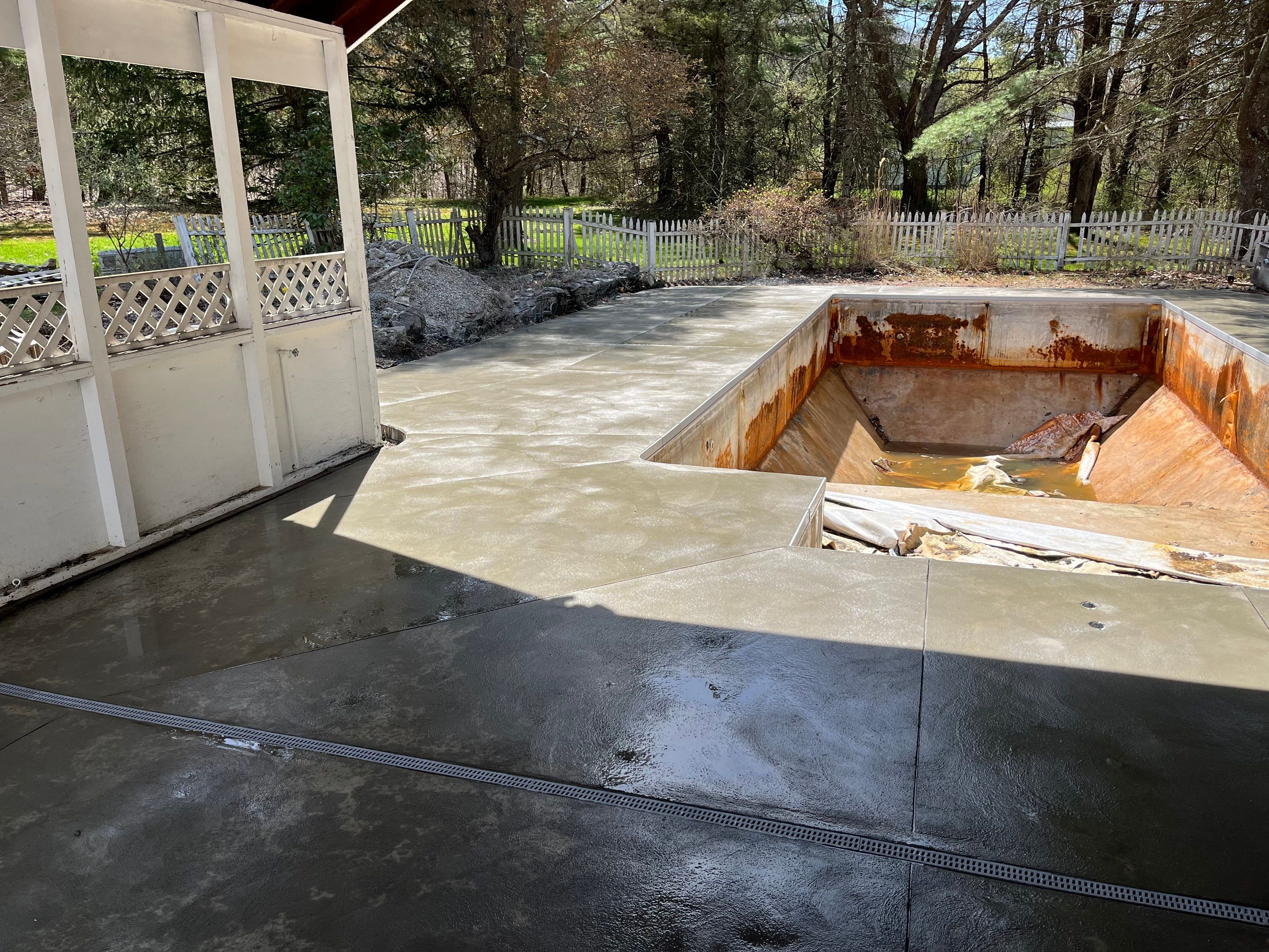 In-Ground Swimming Pool Renovation and Concrete Decking in Old Chatham by Cypress Pools and Spas