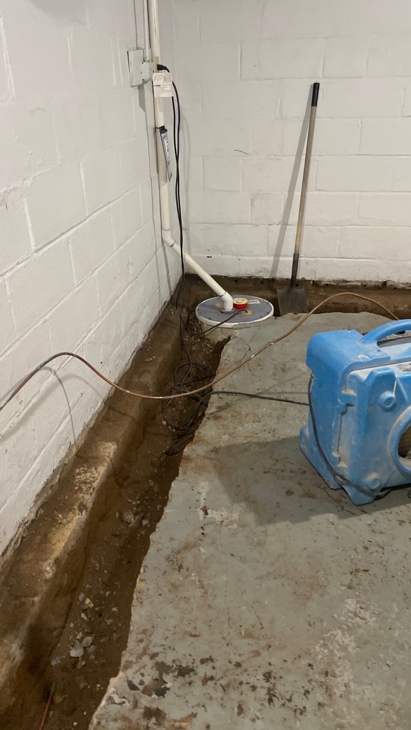 Interior Drain Tile & Yard French Drain in St. Paul, MN by Waterproofing Northeast