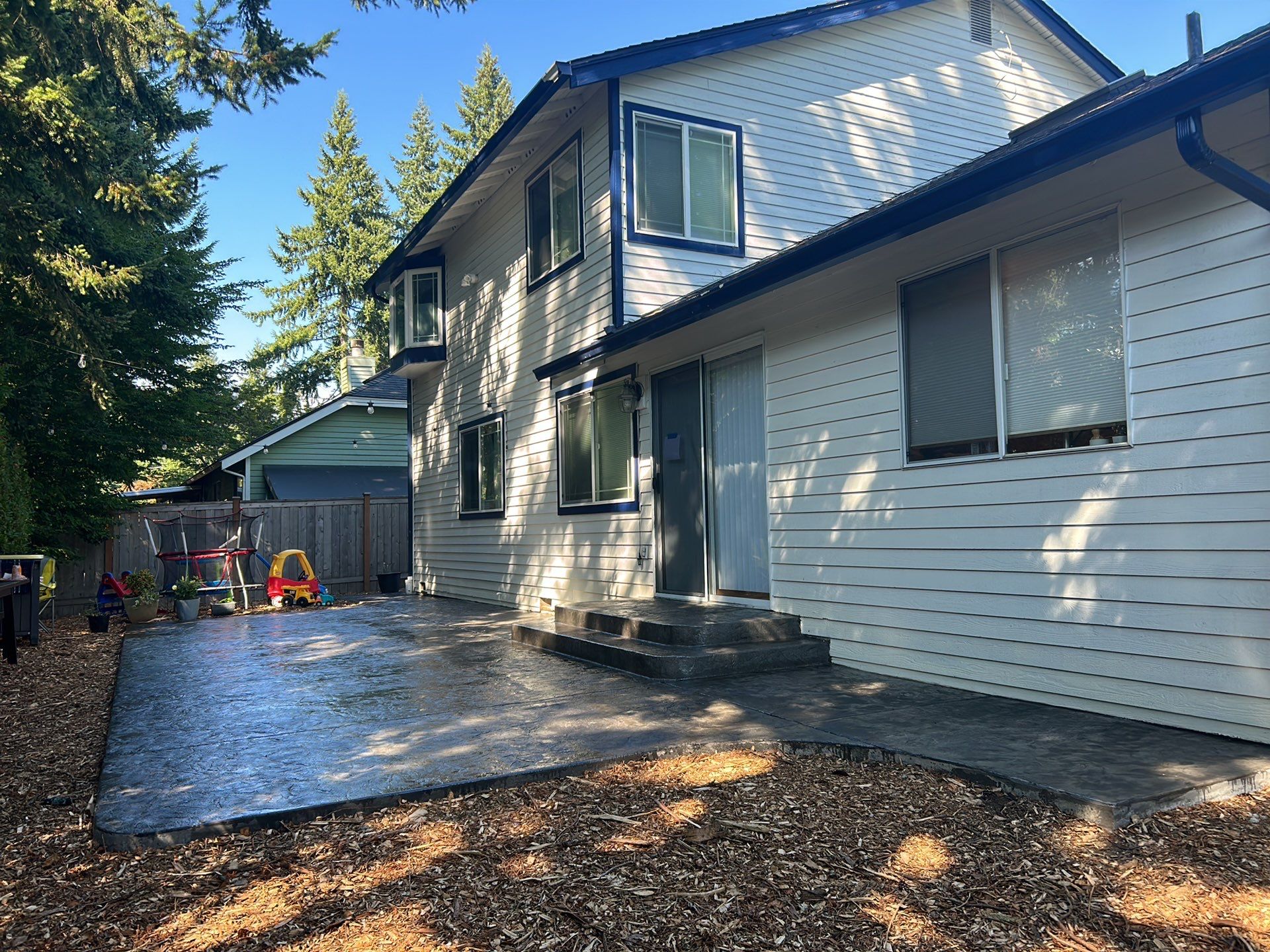 Luo | Colored Stamped Concrete Patio by Jireh Asphalt & Concrete Inc 