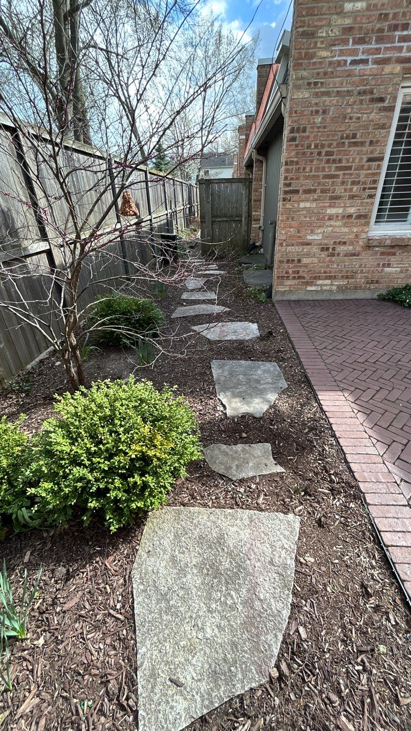 Flagstone stepper cleaning by Northern Power Washing LLC.