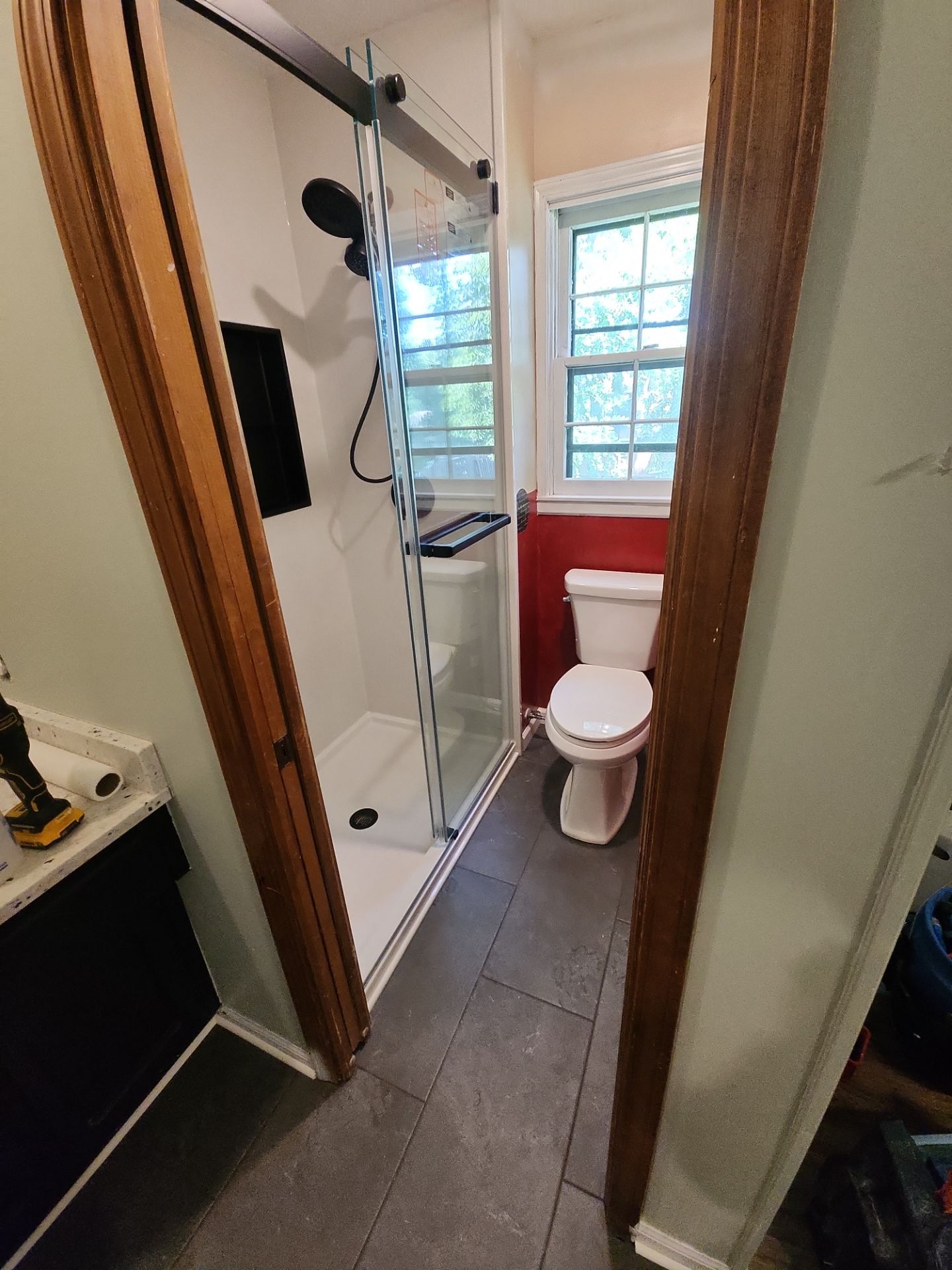 Bathroom Remodel using Tile Floor by The Shower Company