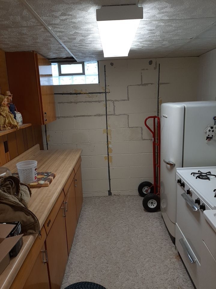 Wall Straightening and Reinforcement using Embedded Fiber Reinforcement by Toledo Basement Repair 