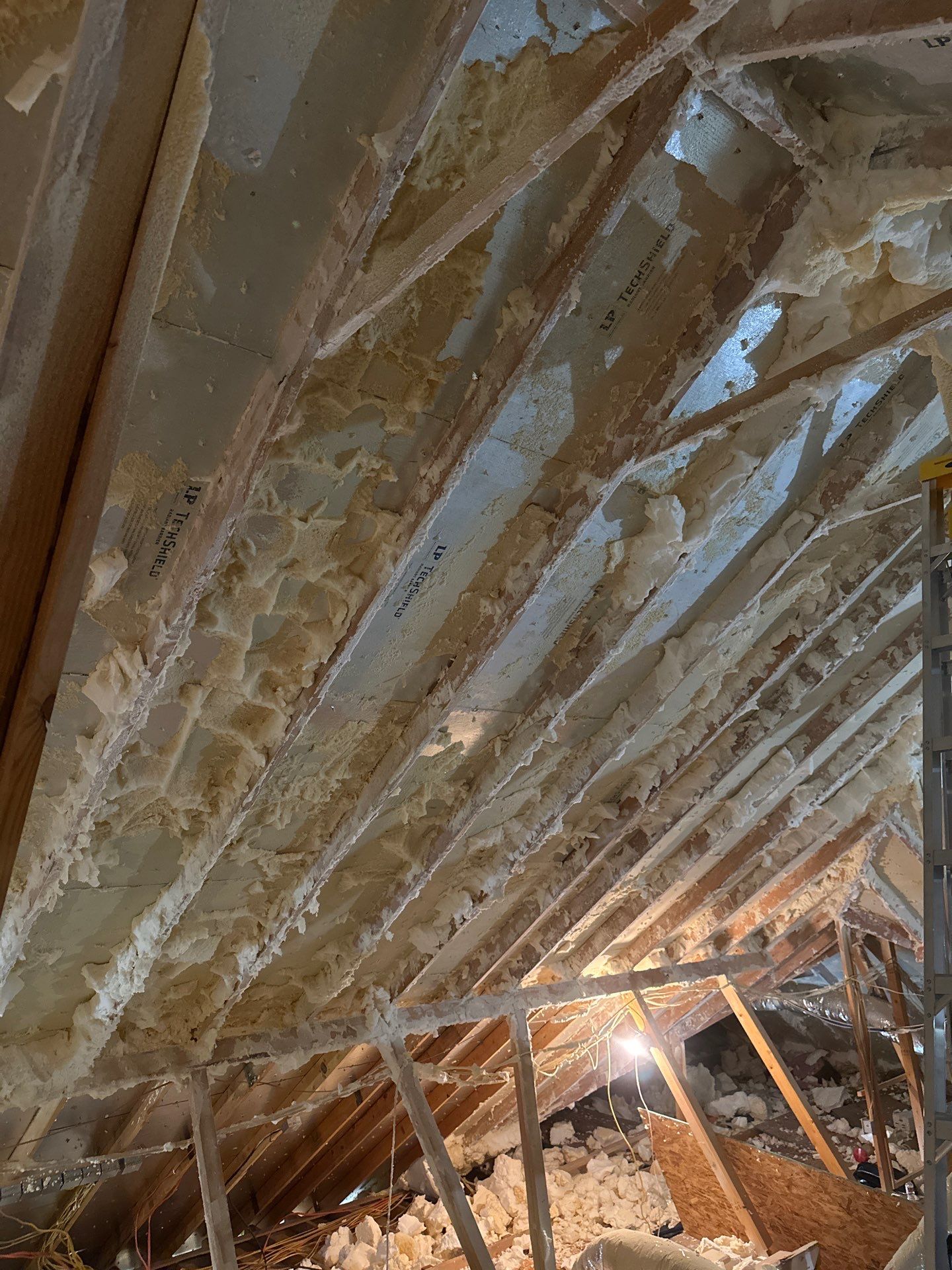 Spray foam insulation removal & re spray by Apex Insulation Solutions