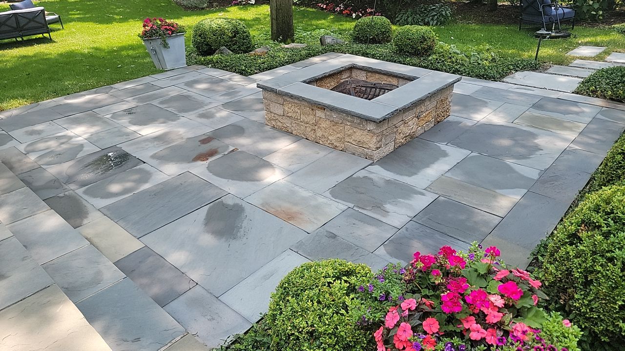 Northbrook, IL stucco home soft wash and stone cleaning by Northern Power Washing LLC.