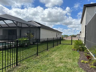 Aluminum Fence Installation using Black 3 Rail Aluminum Fence
