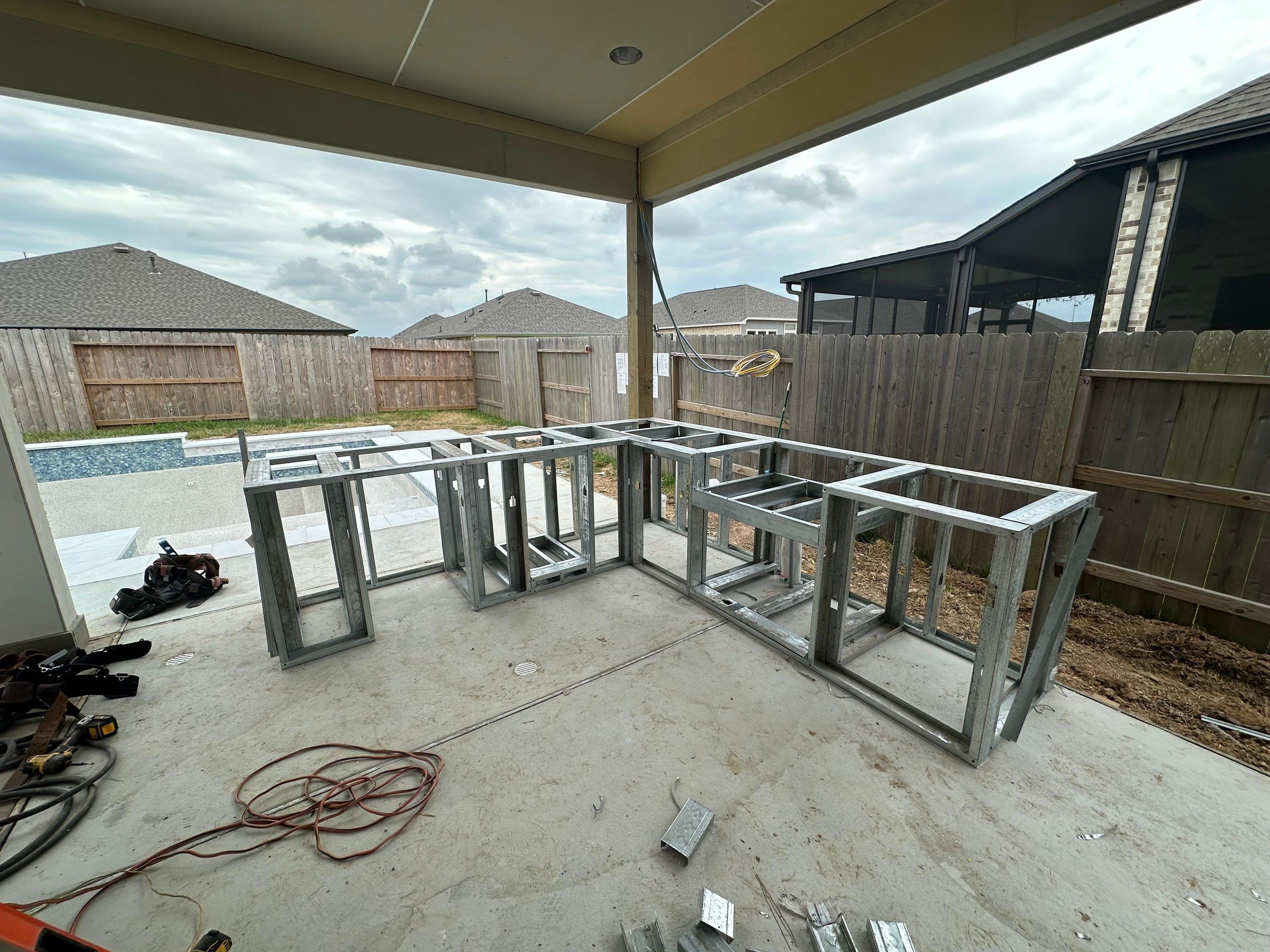 Patio and Summer Kitchen in Texas city by SophAlx LLC