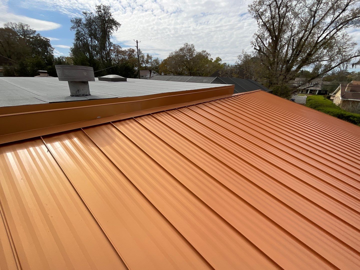Residential Re-Roof using MS Metals, Copper Penny, Standing Seam. by First Due Roofing