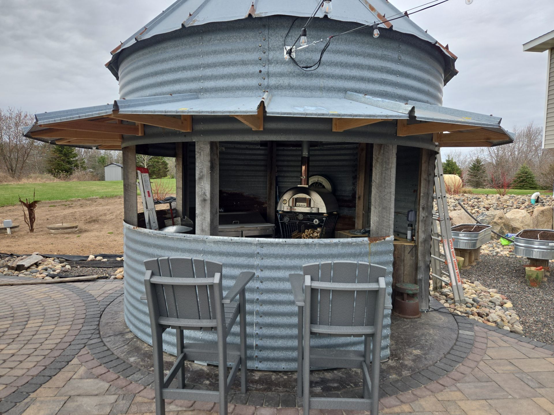 Paver Patio/ Outdoor Living Area/ Raised Garden Beds/ Water Feature by Balsam Lake Pro Lawn