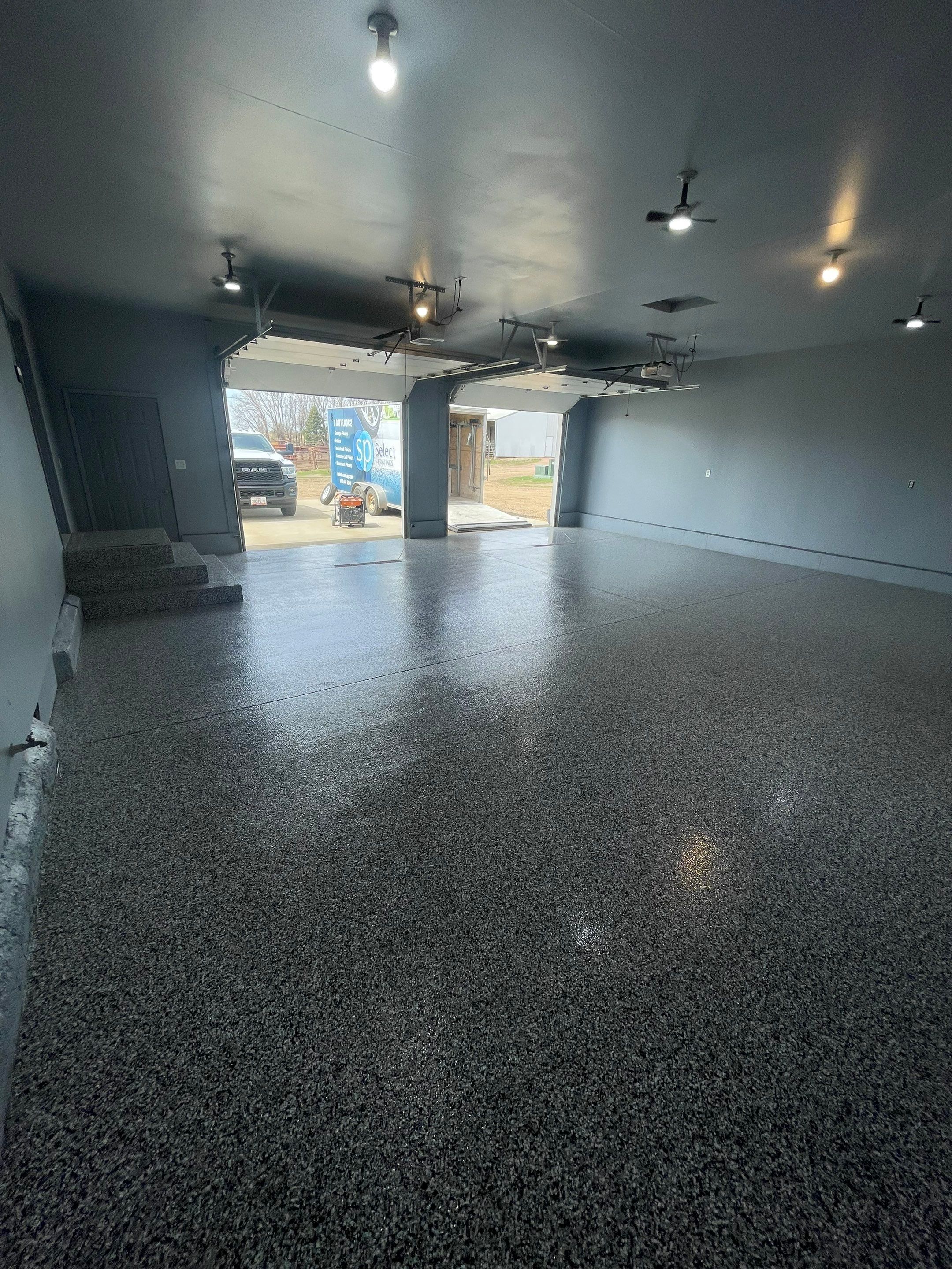Grey Granite-Style Garage Floor Coating and Stairs in Hartford by Select Painting, Coatings & Garage Cabinets