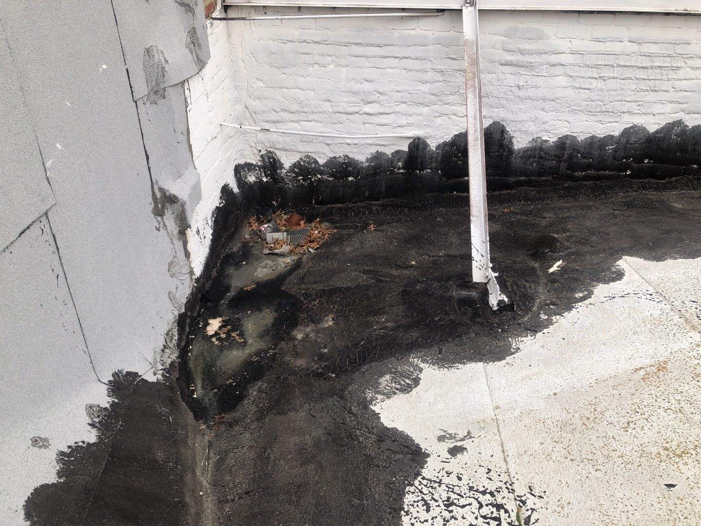 Spray foam and coatings using Conklin Benchmark/PUMA XL coatings and spray foam by Straight Edge Roofing Inc