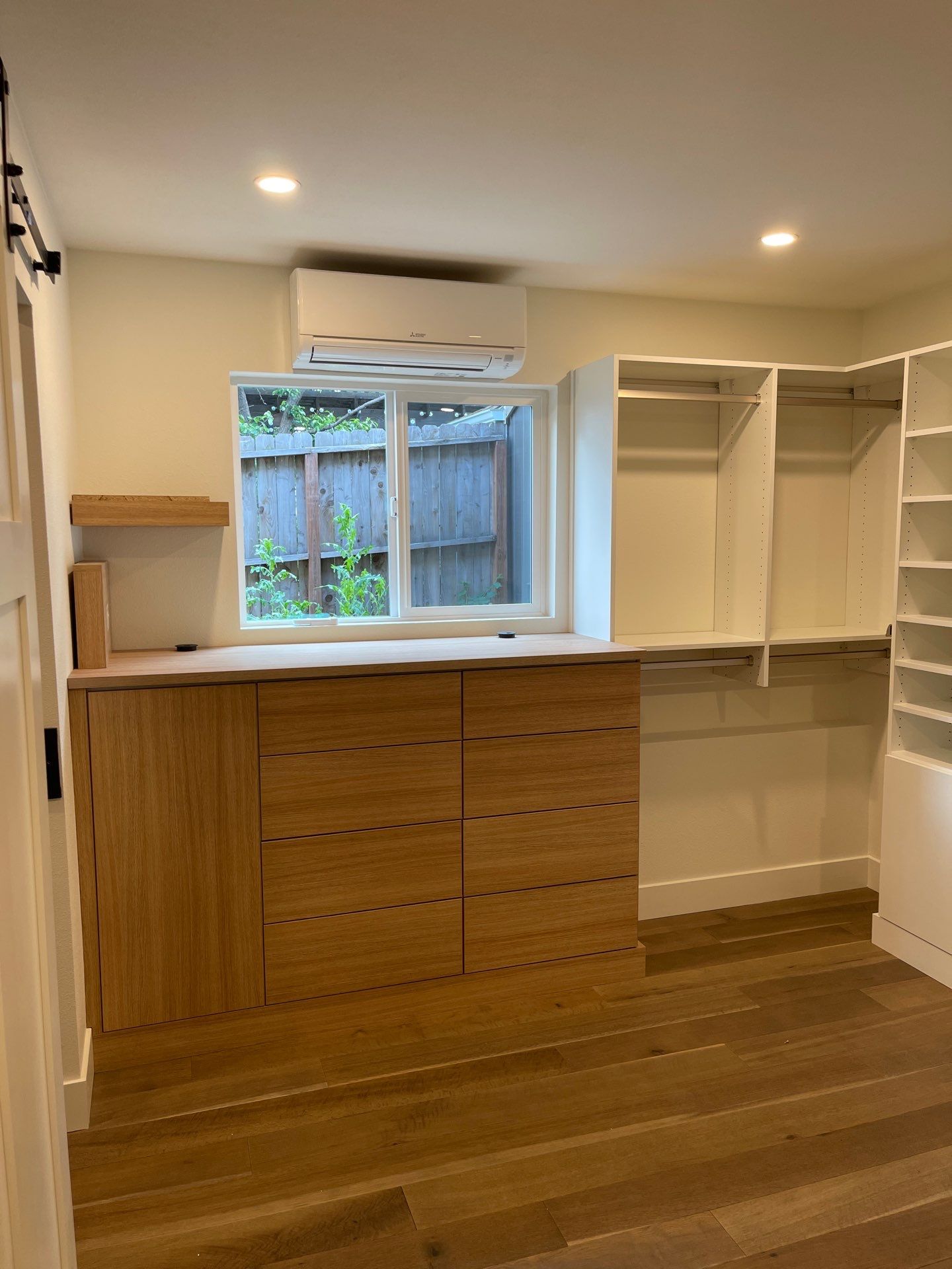 Two-Tone Walk-In Closet in Boulder by Concept 32, Inc.