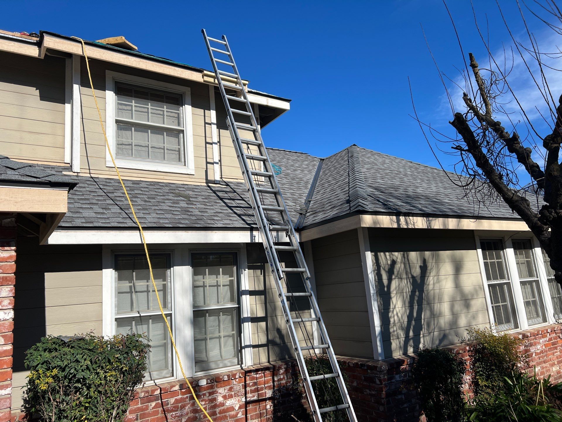 New shingles and gutters using GAF Timberline HDZ shingles and aluminum gutter by Straight Edge Roofing Inc