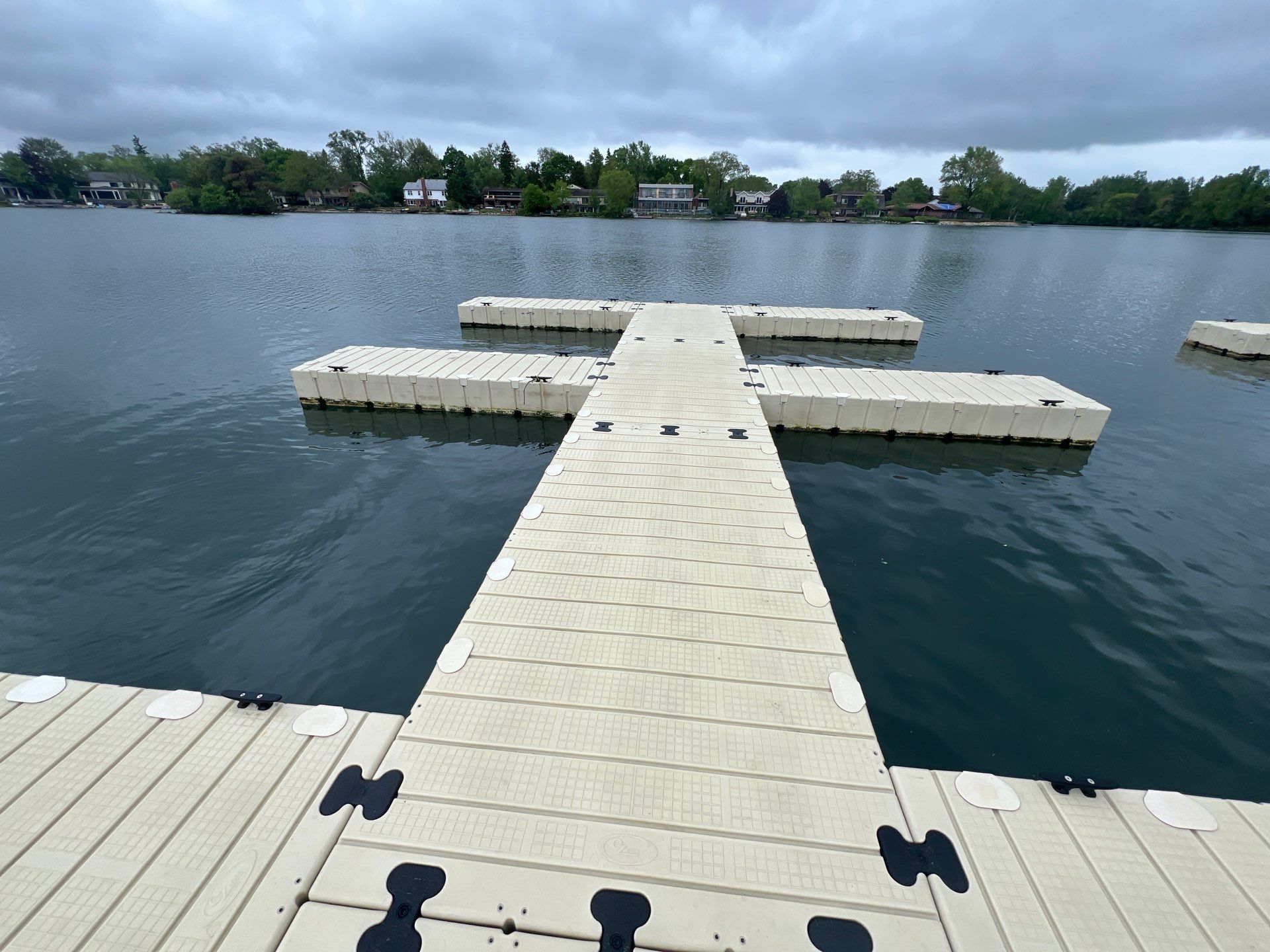 Power washing of floating dock by Northern Power Washing LLC.
