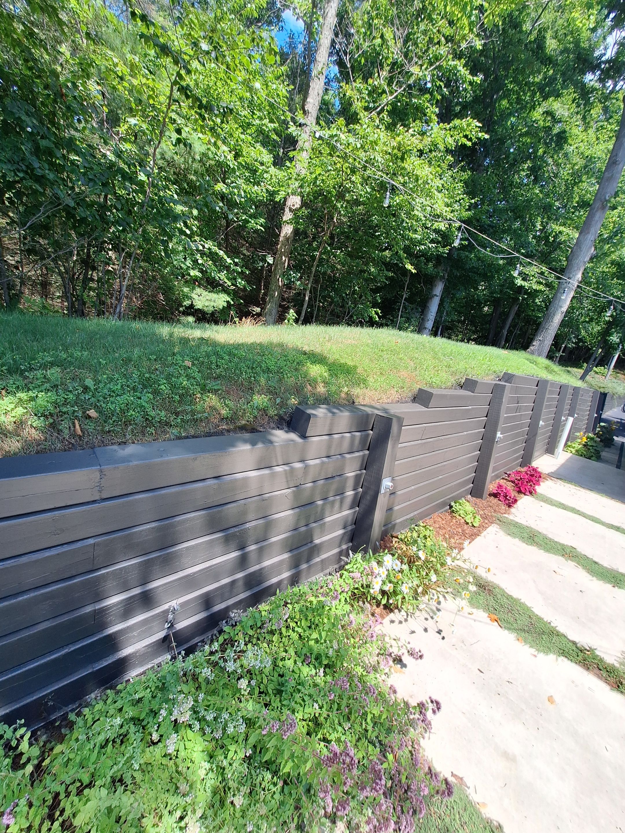 Exterior Retaining Wall Painting | Grand Haven, Michigan by Gordon Painting