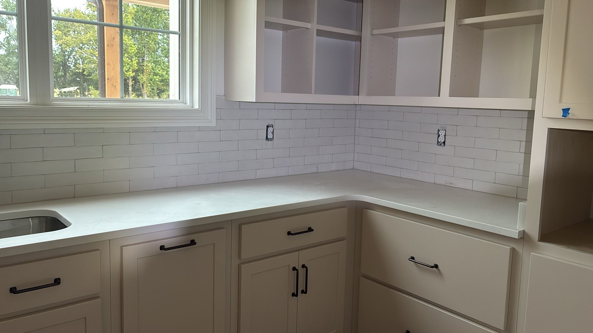 New backsplash by Knockout Flooring LLC