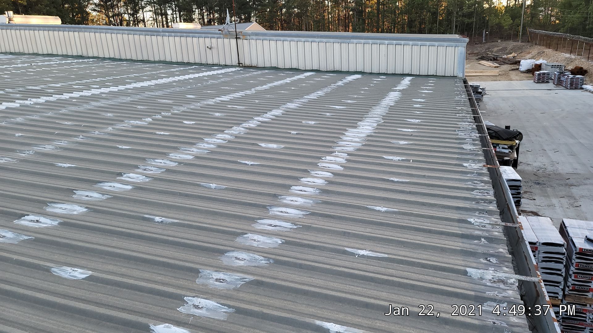 Commercial Roofing Installation using Aldocoat Coatings by Hostetler Roofing