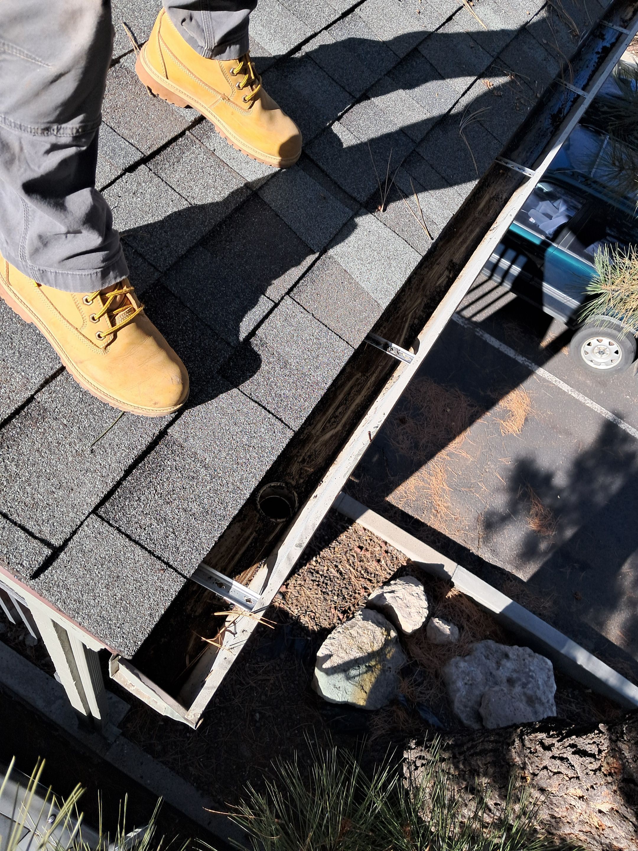 HOA gutter cleaning in Flagstaff, AZ after photo showing full gutters.