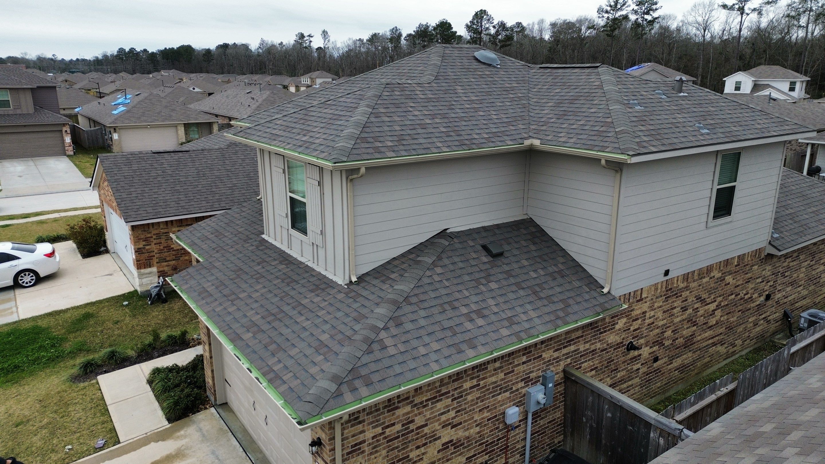 New Caney Roof Installation using Atlas Pinnacle Pristine by Modern BYLT Roofing & Construction